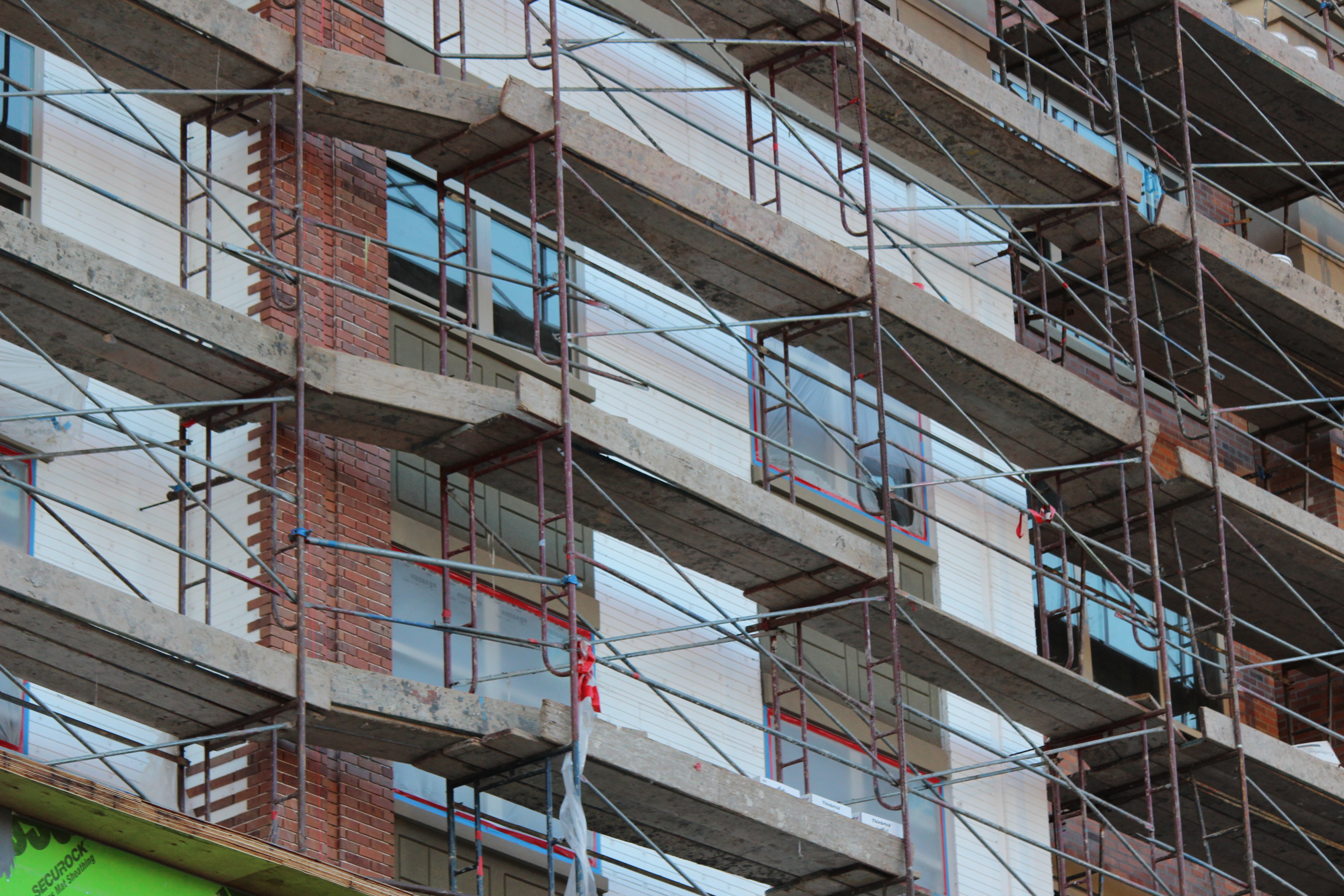 Why CI Wall Details Get Complex With Thin Brick